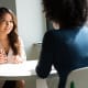 Two professionals in a job interview conversation