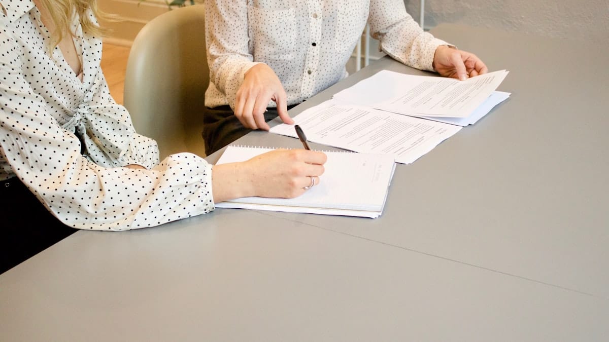 Recruiter reviewing a printed CV