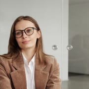 executive-interview-hero-2420×846 Executive interview candidate holding the attention of a two-person senior panel